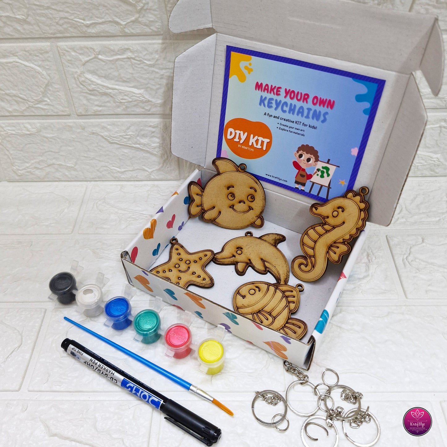 Make your own keychains DIY kit with wooden animal shapes, paint anf keyrings sea animal craft creative kids learning