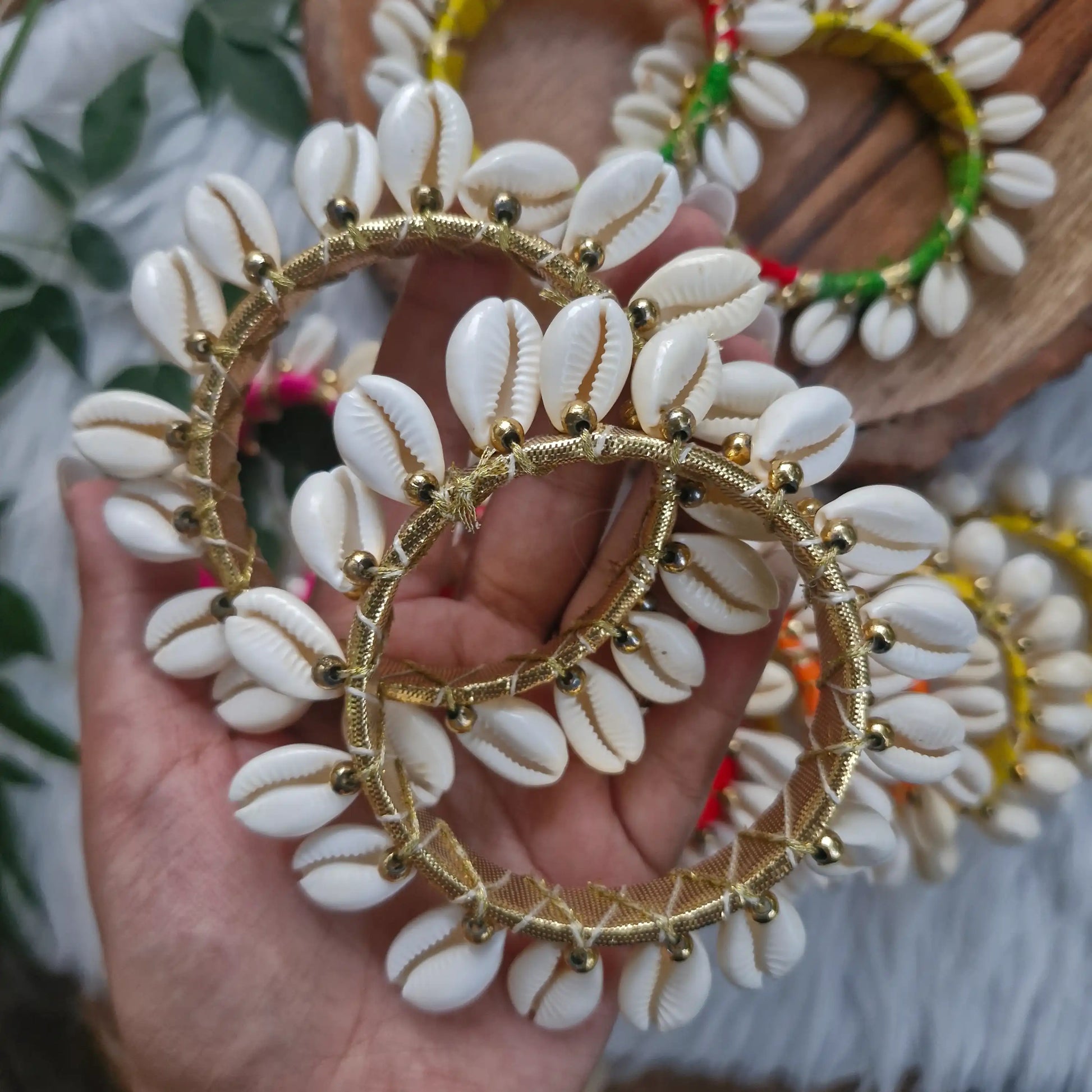 Handmade cowrie shell bangle wrapped in Golden thread for Diwali and festive décor
